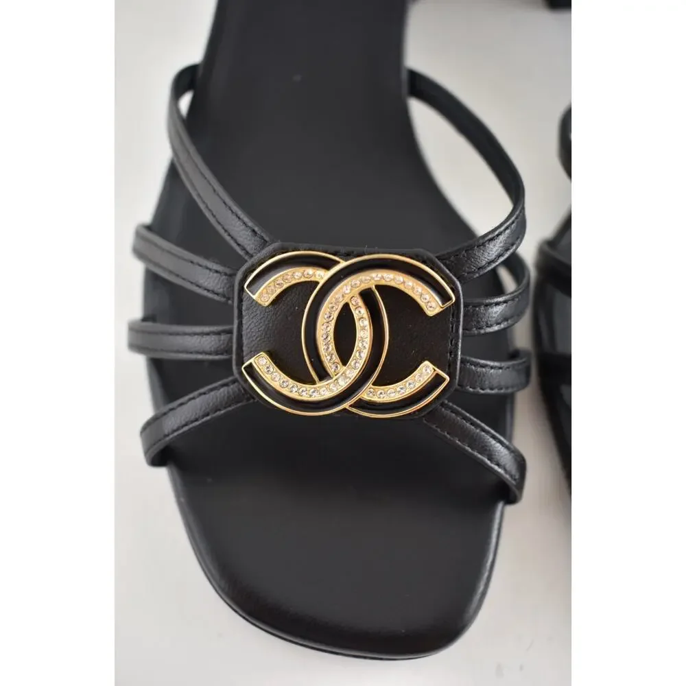 Chanel 25P Black Leather Crystal Gold CC Logo Ankle Strap Block Heel Sandal 37.5